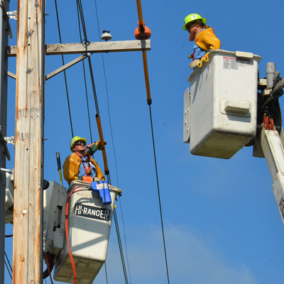 Linesmen working on power lines